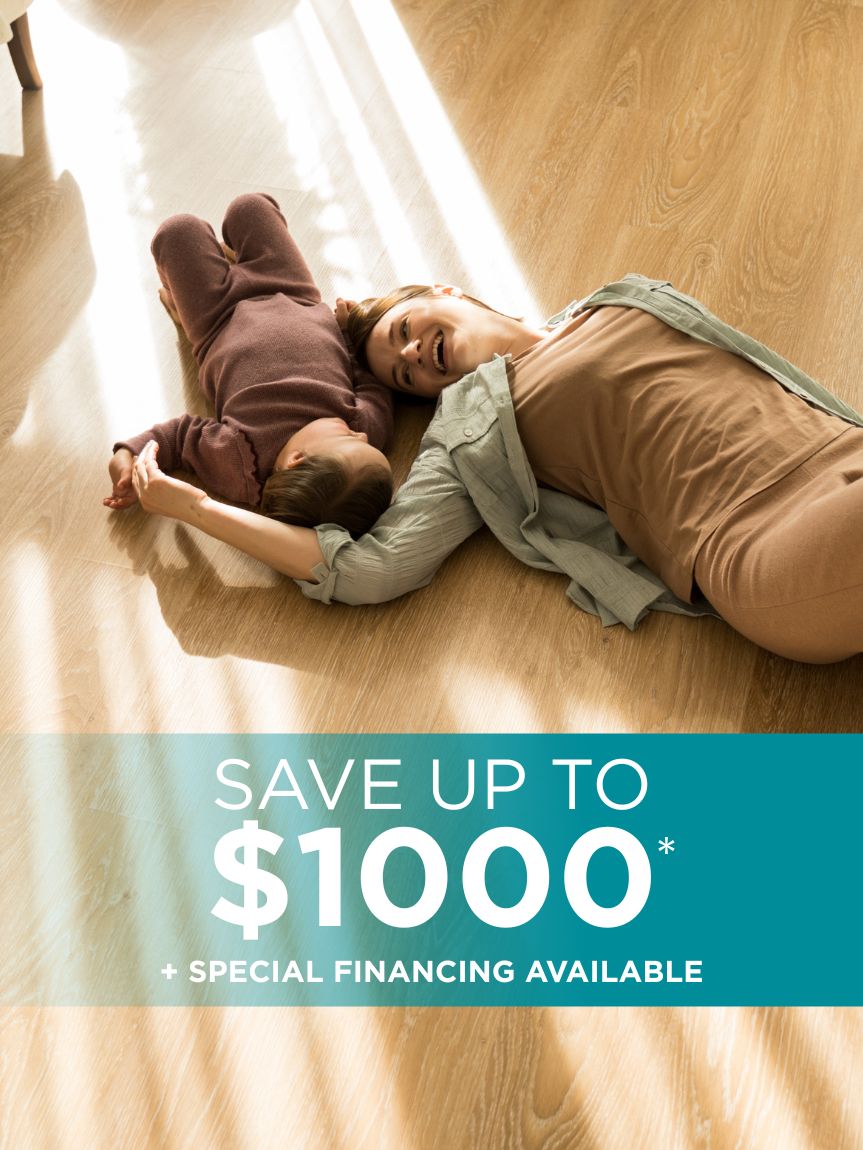 kids playing on newly installed Carpet One vinyl flooring in playroom